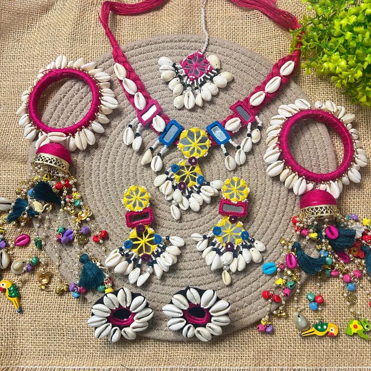 Mirror and cowrie shell jewellery set