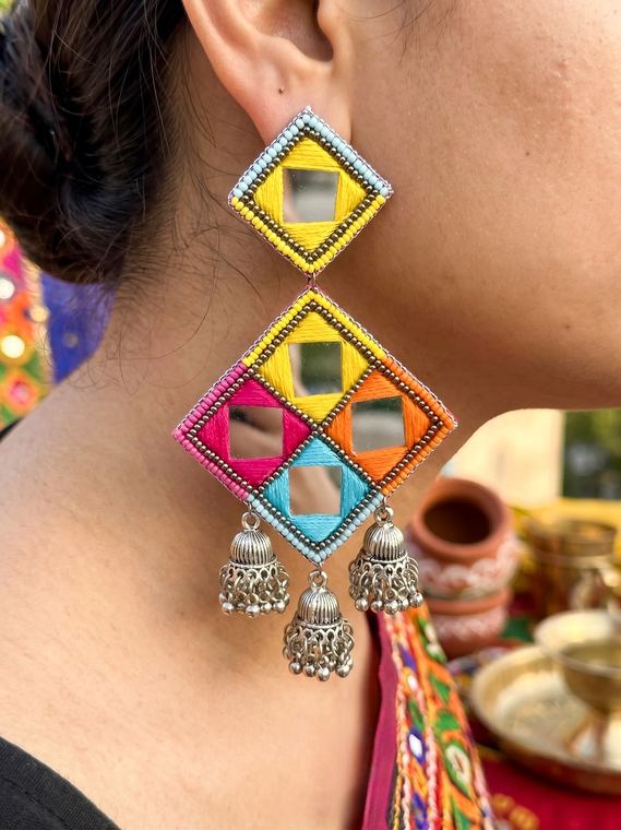 Statement mirror-work earrings worn